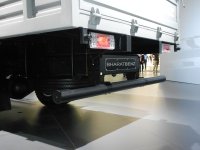 1280px-BHARATBENZ_Light_Duty_Truck_914_R._underride_protection_2._Spielvogel_2012.jpeg